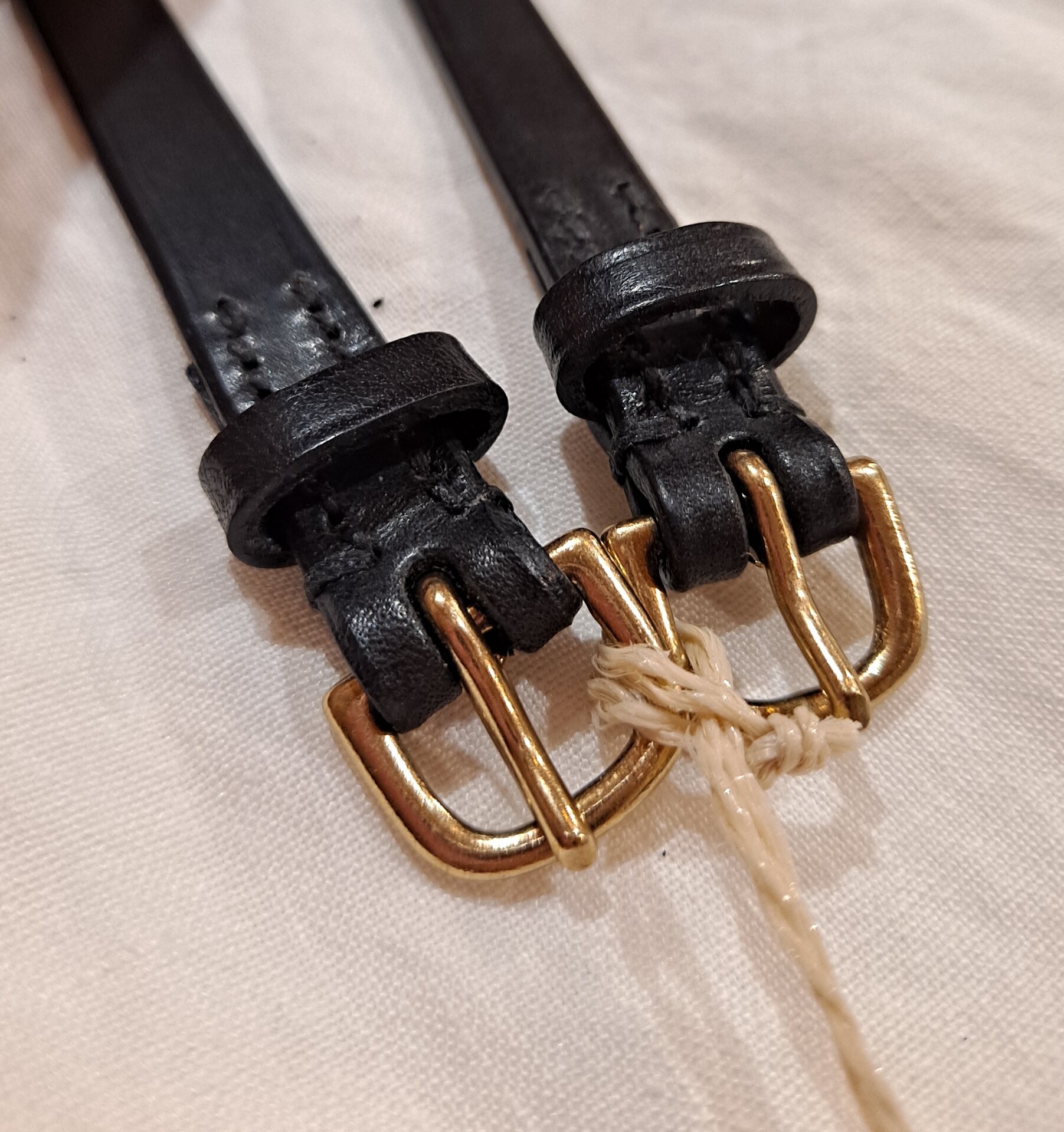 Döbert kannusremmit Musta/Messinki